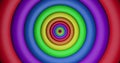 Image of rainbow circles and colours moving on seamless loop Royalty Free Stock Photo