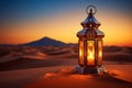 Image Ramadan Kareem background Arabic lantern in desert at sunset glow Royalty Free Stock Photo