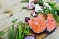 Image of raw salmon steaks with different vegetables and mushrooms Royalty Free Stock Photo