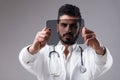 Graphic-ready image, blurred doctor, transparent tablet