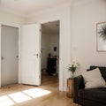 Rear back view of excited walking in his apartment entering new home happy guy standing in doorway of modern flat looking at Royalty Free Stock Photo