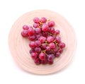 Image of red grape bunch in plate over white Royalty Free Stock Photo