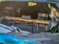 Remains of a completely burned-out passenger car on the street of Rome, Italy Royalty Free Stock Photo