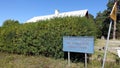 A school closed in Scandinavia and a sign on which it says, School closed by ignorant politicians