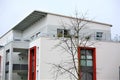 An Image of a residential home with modern facade painting, exterior shot