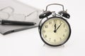 Image of retro alarm clock and business objects Royalty Free Stock Photo