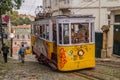 An image of retro tram in narrow street of Lisbon,Portugal.