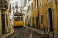 An image of retro tram in narrow street of Lisbon,Portugal.