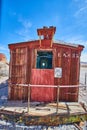 Rhyolite abandoned ghost town red painted wooden train cart from end