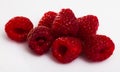 Image of ripe red fresh raspberries on white surface Royalty Free Stock Photo