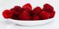 Image of ripe red fresh raspberries on white surface Royalty Free Stock Photo