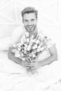 image of romantic man with march tulips bouquet. romantic man with march tulips. romantic man Royalty Free Stock Photo