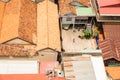 Image of roofs in Phnom Penh. Diferent types of house.