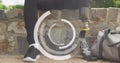 Image of rotating circular scanner over male athlete with prosthetic leg using smartphone