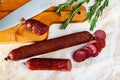 Image of russian smoked sausage cut in slices, close-up