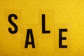 Image of sale text gold background