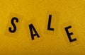 Image of sale text gold background