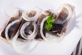 Image of salted herring with onions