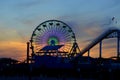 Ferris wheel with sunset in the background
