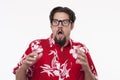 Image of a scared young man in Hawaiian shirt Royalty Free Stock Photo