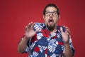 Image of a scared young man in Hawaiian shirt Royalty Free Stock Photo