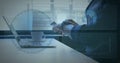 Image of scope scanning, globe spinning on screen over woman using laptop in office