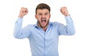 Image of screaming angry young bearded emotional man standing over white wall background isolated.