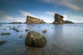 Sea sunrise, near the ship rocks Royalty Free Stock Photo