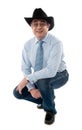 Image of a senior cowboy posing semi seated Royalty Free Stock Photo