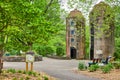 Sensory Garden sign leading to two old silos with pride benches along trail in summer Royalty Free Stock Photo