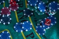 Image of several red dice falling on green table on background of multicolored spots Royalty Free Stock Photo