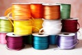 an image of several spools of colorful ribbons