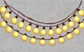 The image showcas. hghees a string of lights, featuring multiple round bulbs . generative ai