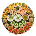 Assorted appetizers and dips arranged on a circular platter for a festive spread isolated on white background Royalty Free Stock Photo