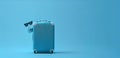 Suitcase, Minimal Travel Concept with blue background