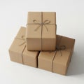 Elegant stack of brown gift boxes with twine bows Royalty Free Stock Photo