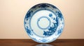 Antique Blue and White Chinese Porcelain Plate with Floral and Bird Motif Design Royalty Free Stock Photo