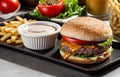Grilled beefburger and fries a classic meal ai generated Royalty Free Stock Photo