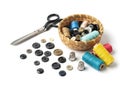 Sewing Supplies Buttons, Spools of Thread, Scissors, and Thimbles on White Background Royalty Free Stock Photo
