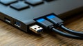 Close up of a laptop USB port with cables connected. This image captures the essence of modern technology and Royalty Free Stock Photo