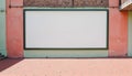 A Blank White Billboard Centered On A Brick Wall Outdoors Royalty Free Stock Photo