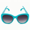 Stylish turquoise sunglasses with gradient lenses and light blue frame accents Royalty Free Stock Photo