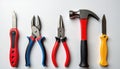 This image showcases a set of common household tools arranged in a row on a white background. Royalty Free Stock Photo