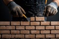 Bricklayer Installing Masonry with Trowel on Exterior Wall Royalty Free Stock Photo