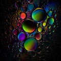 A close-up view of colorful oil bubbles on a dark background Royalty Free Stock Photo