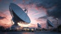 satellite dishes sunset sky antennas Royalty Free Stock Photo