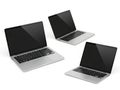 Three modern laptops displaying black screens on white background Royalty Free Stock Photo