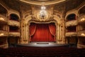 This image showcases a traditional theater with a striking red curtain and a stunning chandelier, creating a sophisticated