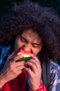 Tunisian Man Savoring Watermelon Slice