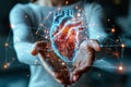 Digital health concept with a virtual heart diagram held in hands Royalty Free Stock Photo